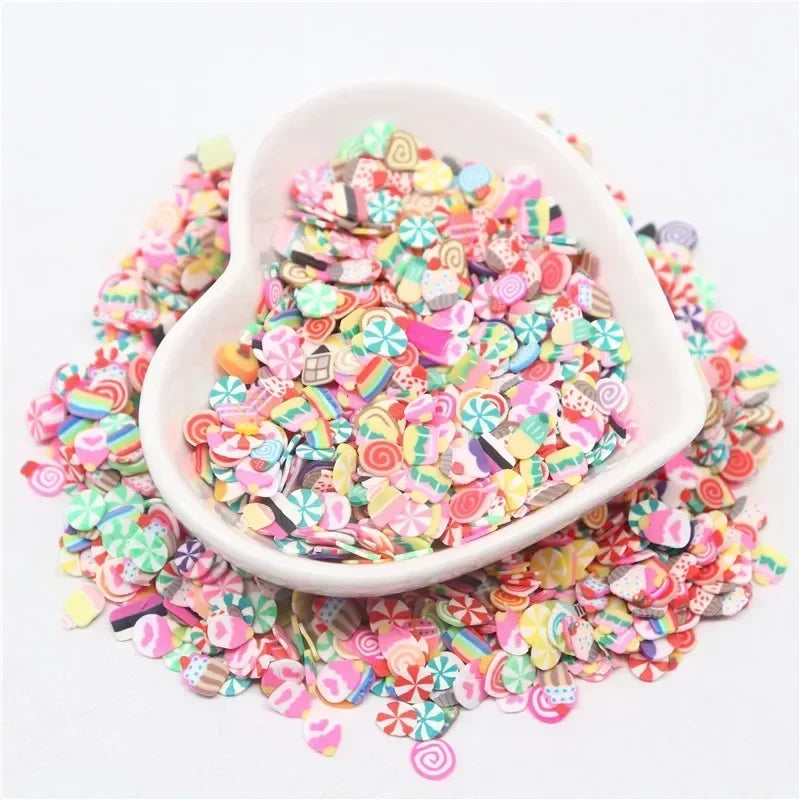 A white dish filled with colorful polymer clay sprinkles for slime and craft decor