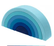 A set of soft silicone rainbow building blocks in shades of blue and cyan, shown at an angle.