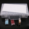 A clear plastic storage box for diamond painting supplies featuring an organizer tray and small compartments for beads or gem