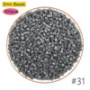 A pile of 5mm gray beads, labeled #31, for a creative fuse beads craft kit.