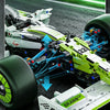 A detailed model of a Formula 1 racing car suspension system with shock absorption components and wheels.