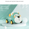 A cute green bear police car toy with yellow accents is displayed on a white circular base.