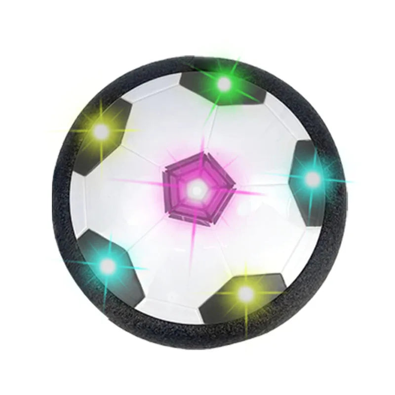A glowing LED hover soccer ball with illuminated panels and a black textured surface.