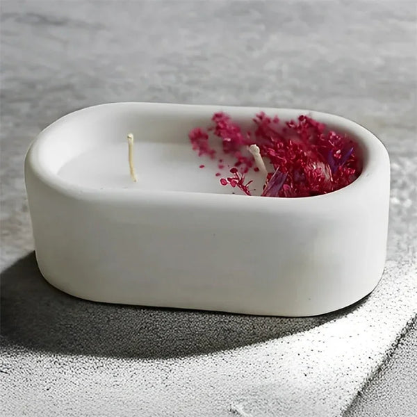 White silicone epoxy glue mold containing dried pink and purple floral crystals