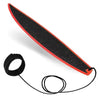 A black and orange mini finger surfboard skateboard toy with a string attached.