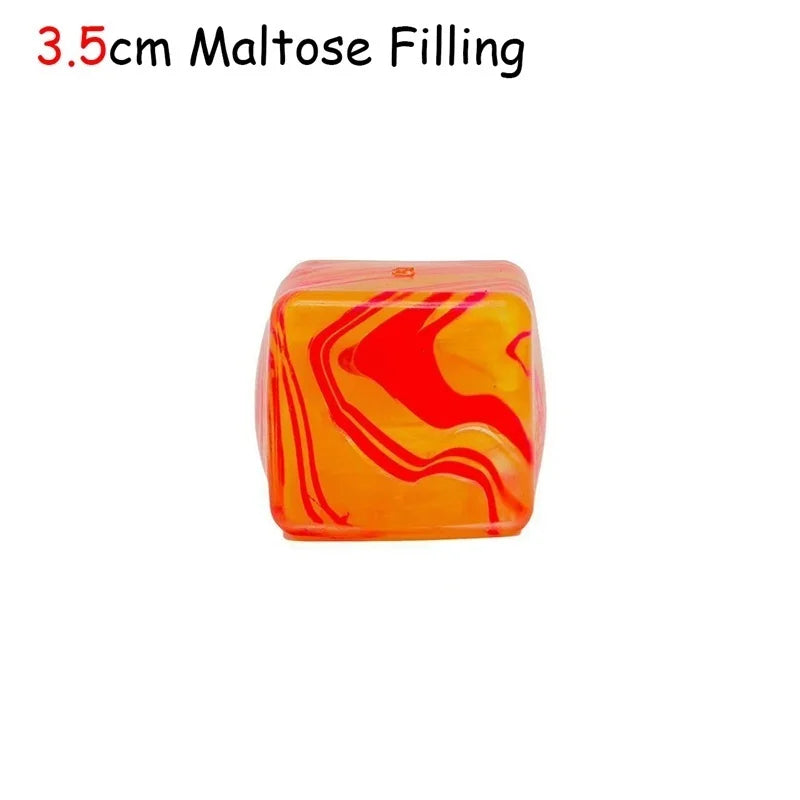 An orange cube toy with swirling red and yellow patterns, described as 3.5cm Maltose Filling.