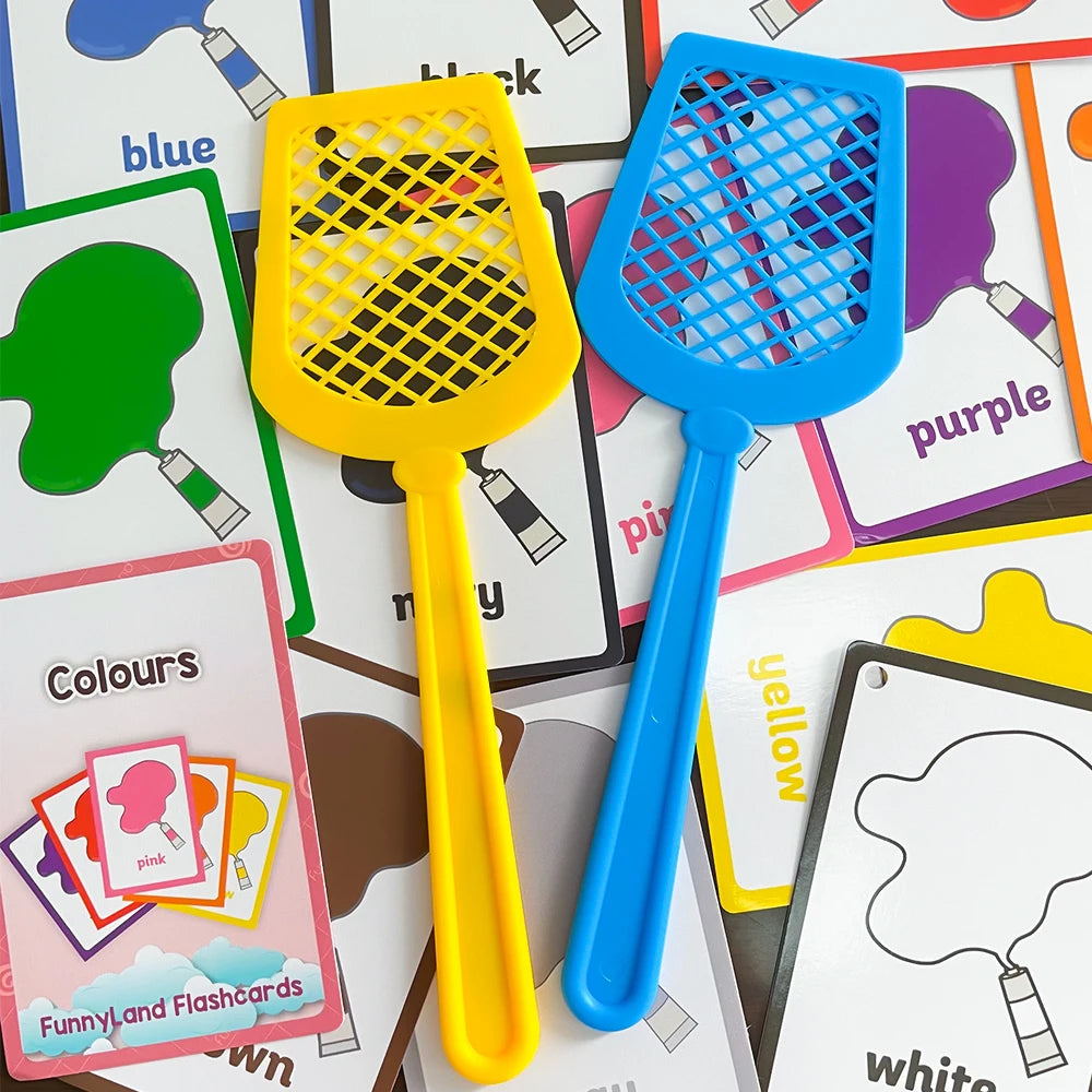 A set of four colorful plastic fly swatters in yellow, blue, purple, and yellow are displayed on cards.