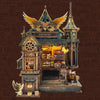 A detailed wooden miniature kit of an illuminated owl post office with furniture and a magic moment scene.