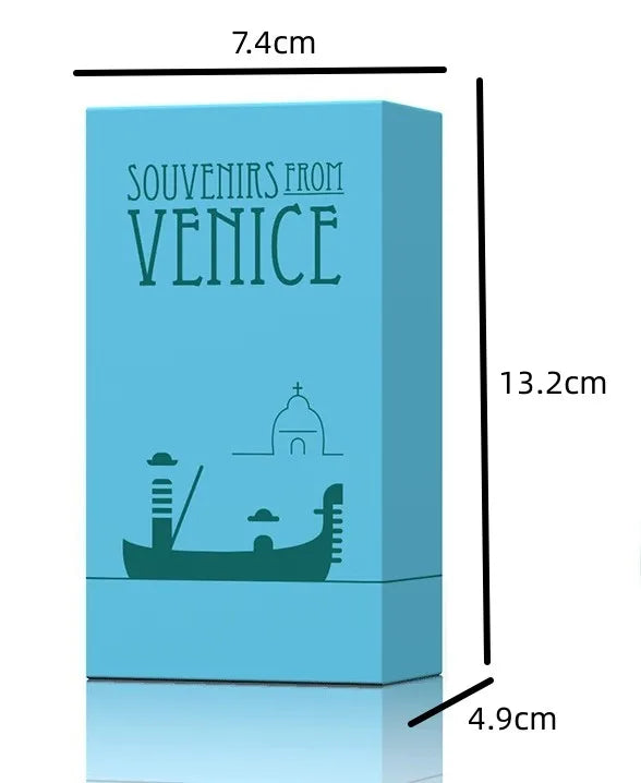 A light blue box labeled Souvenirs from Venice featuring a silhouette of a boat and a dome.