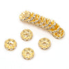 A string of 12mm crystal rhinestone spacer beads in gold color for jewelry making