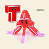 A red alphabet transformable robot toy figure with pink appendages and a box in the background.
