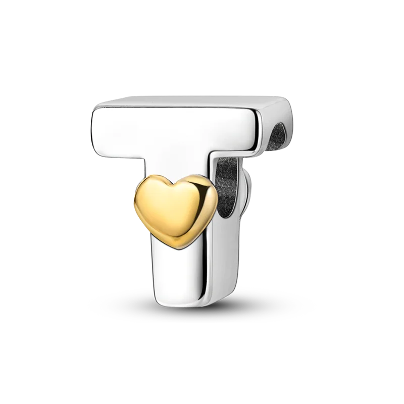 A sterling silver letter T charm with a heart pendant made of gold-toned metal.