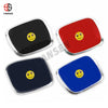 Three car emblems or badges in black, red, and blue featuring a yellow smiley face design.