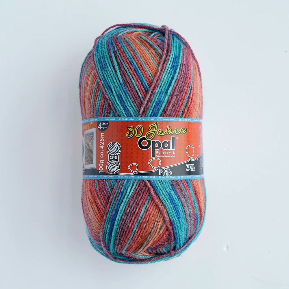 A ball of 100g Opal 4-ply sock yarn featuring a blend of orange, blue, and pink fibers.