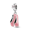 A silver heart charm bead with a pink zircon and a bow detail.