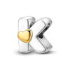 A sterling silver alphabet charm shaped like the letter K with a heart accent, featuring cubic zirconia.