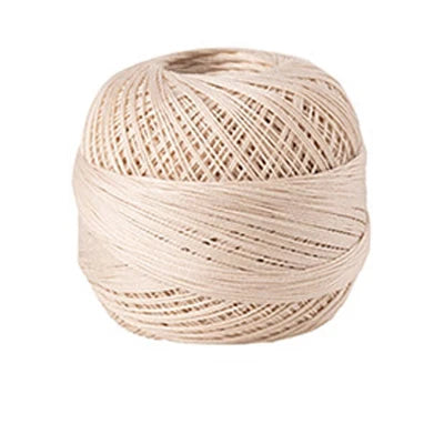 A ball of beige cotton crochet thread used for tatting and embroidery.