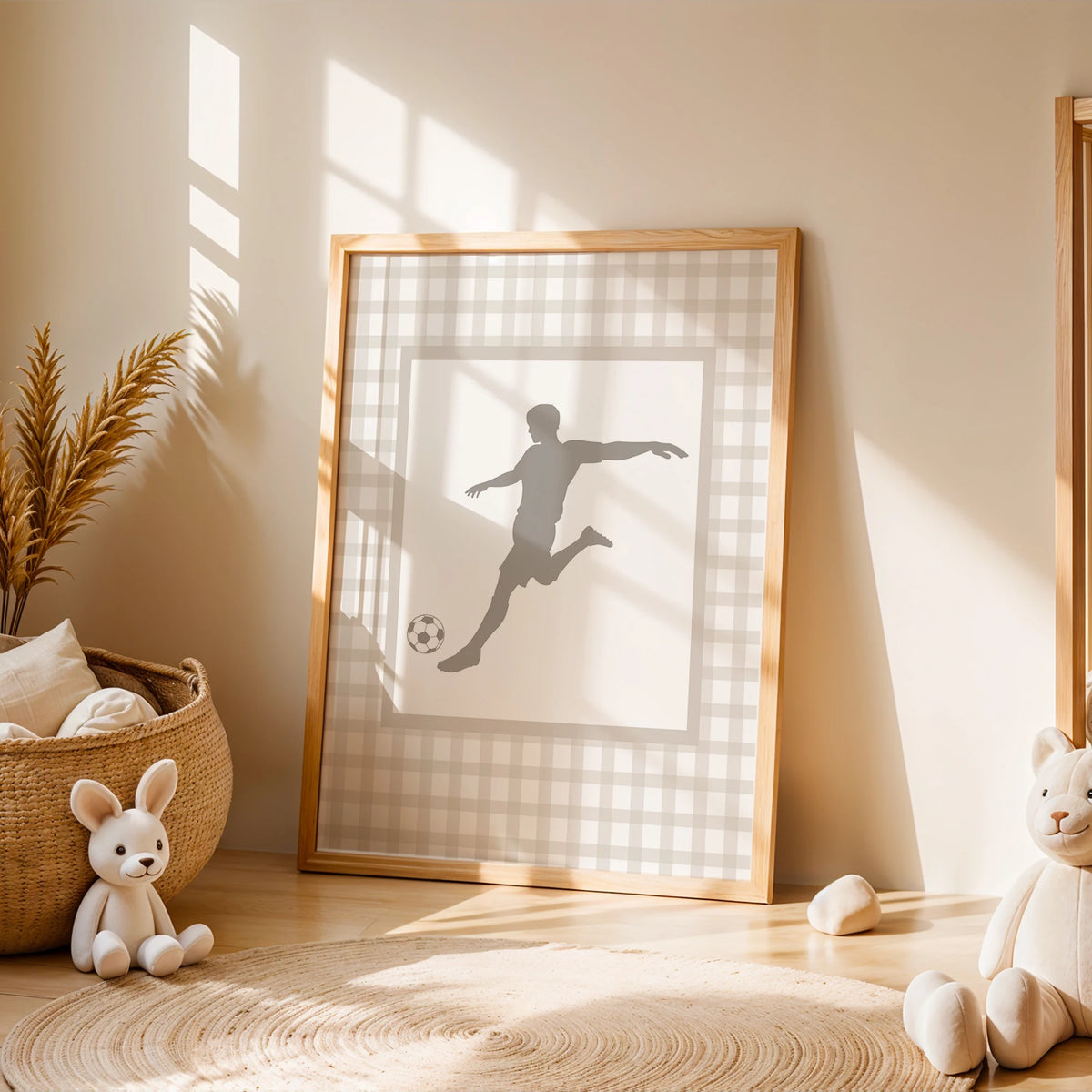 A framed canvas wall art featuring a silhouette of a football player jumping against a light background.