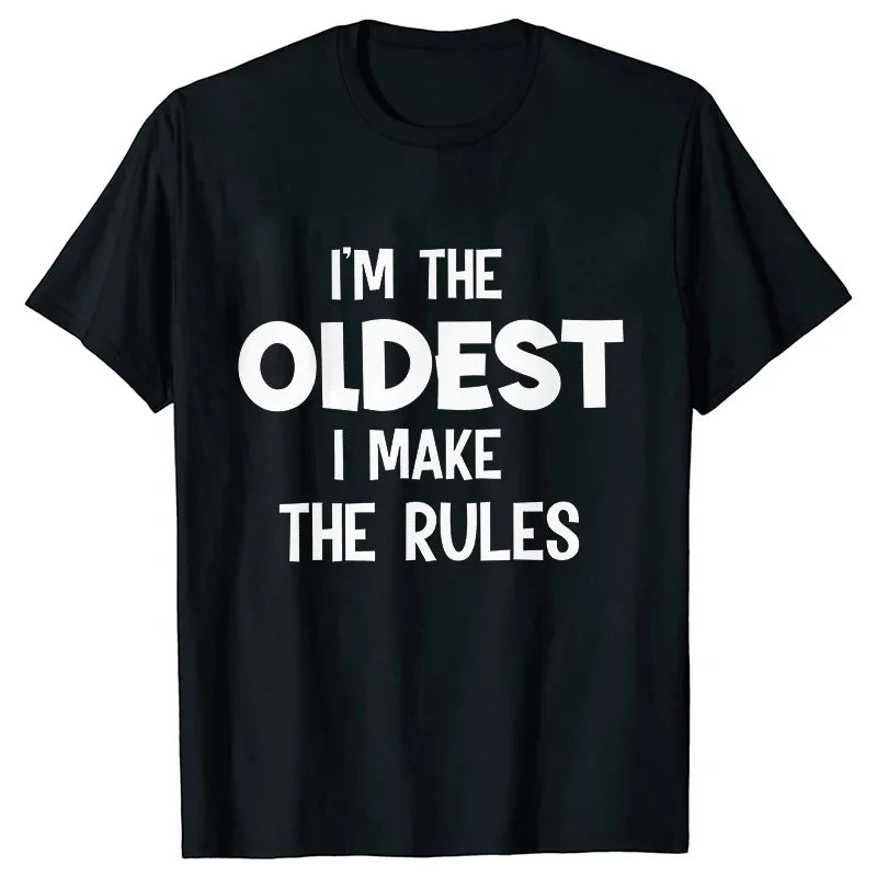 Black t-shirt with white text that reads I'm the oldest I make the rules