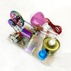 A miniature Stirling engine model featuring a light bulb and colorful metal components.