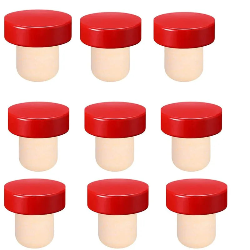 A set of ten reusable red and cream T-shaped wine bottle stoppers shown in various views.