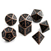A set of premium metal polyhedral dice in a dark bronze finish, including a dodecahedron and an icosahedron.