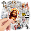 A hand holds a pack of Christian faith waterproof stickers featuring Jesus and religious symbols.
