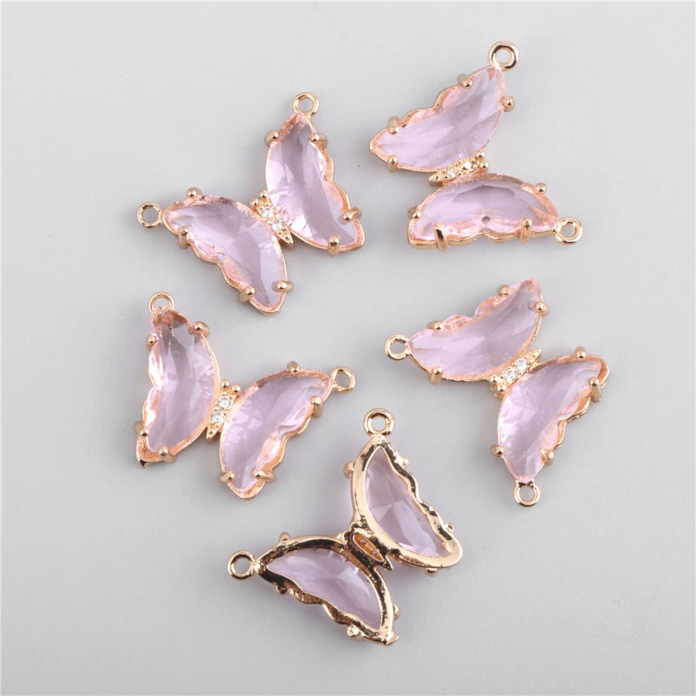 A set of delicate pink crystal butterfly charm beads for jewelry making
