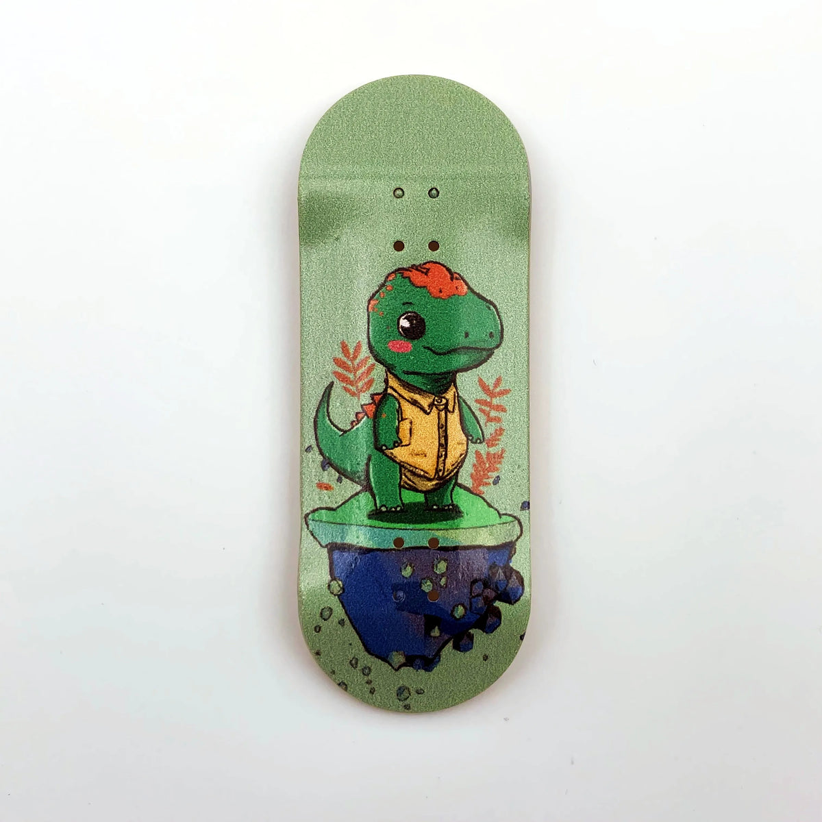 A wooden fingerboard deck featuring a green dinosaur graphic on a light green background.