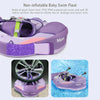 Purple non-inflatable baby swim float with a canopy and tail support floating in clear water