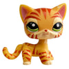 A charming bobble head pet figurine of an orange tabby cat with green eyes and striped fur.