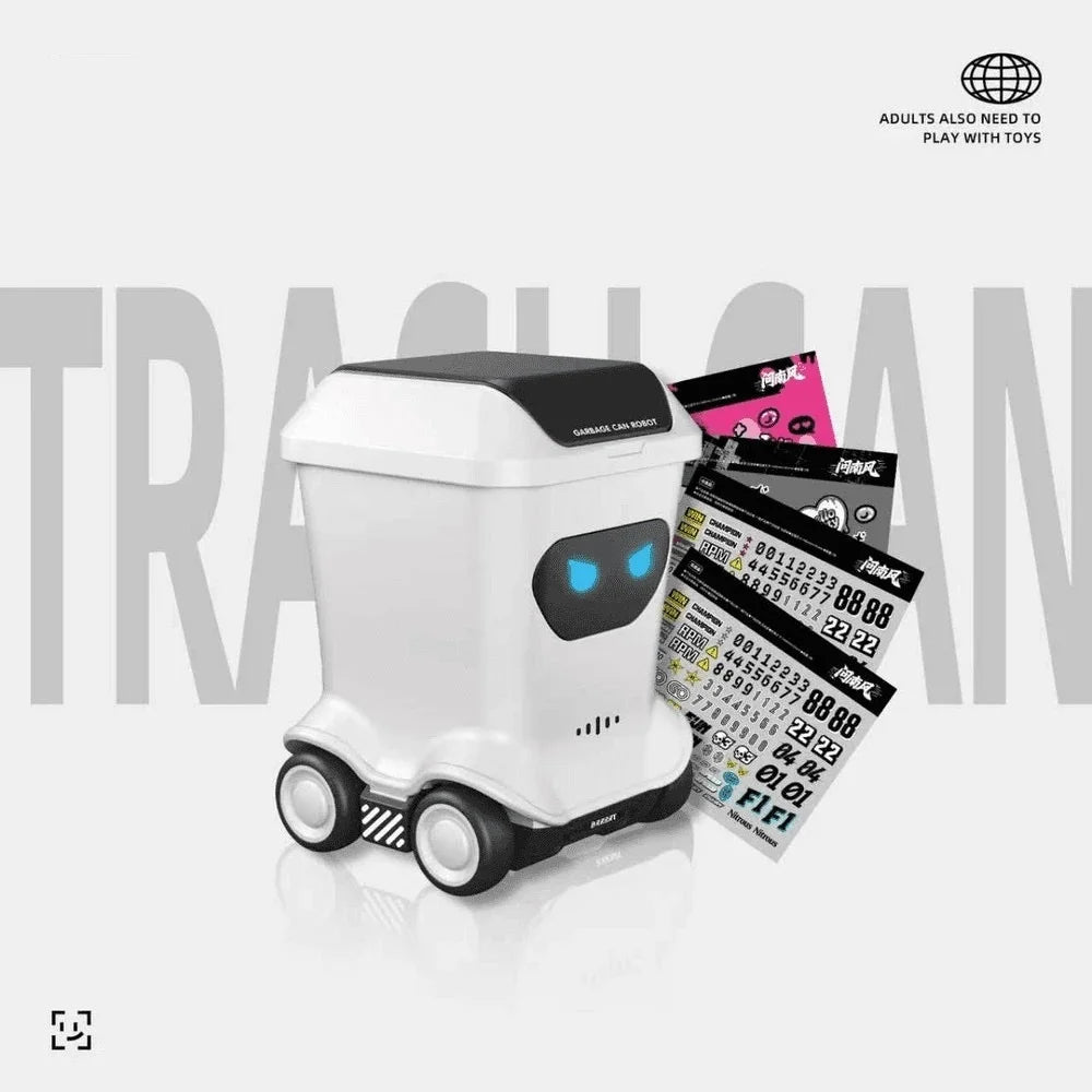 A white mini remote control trash can toy with a black lid and wheels is shown on a light gray background.