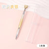 A gold-colored gradient rotating dotting pen is shown next to its clear plastic case.