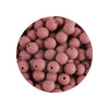 A circular arrangement of pink silicone beads in various sizes for DIY jewelry making