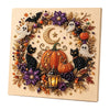 Framed canvas featuring a detailed Halloween wreath of spiders, bats, pumpkins, and ghostly figures in pearl diamond painting