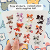 A hand holds a sheet of free stickers featuring various animal bobble heads on white bases.