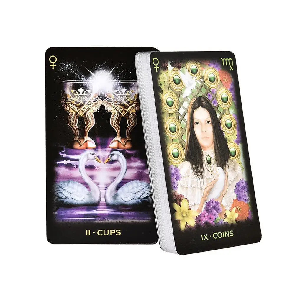 A tarot card featuring a female figure surrounded by green jewels and a crown, part of the Dreams Tarot Deck.