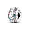 A stack of silver heart charm beads featuring pink and multicolored zircon stones.