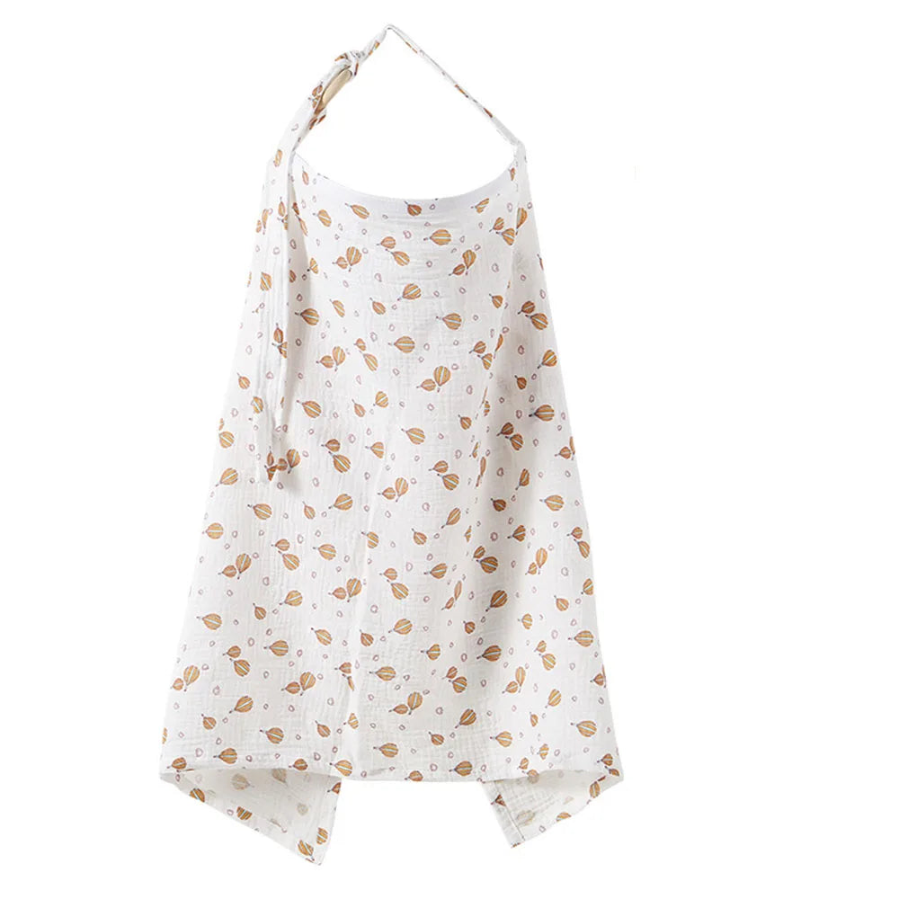 A white breathable muslin nursing cover with a delicate floral pattern, featuring an adjustable neckline.
