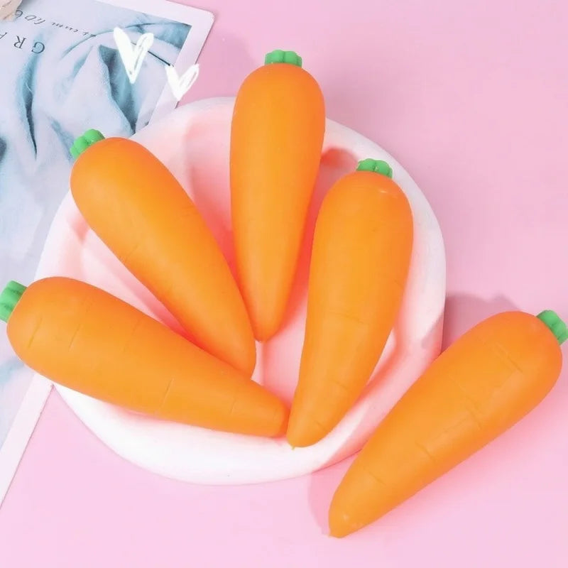 A pile of bright orange carrots arranged on a white plate.