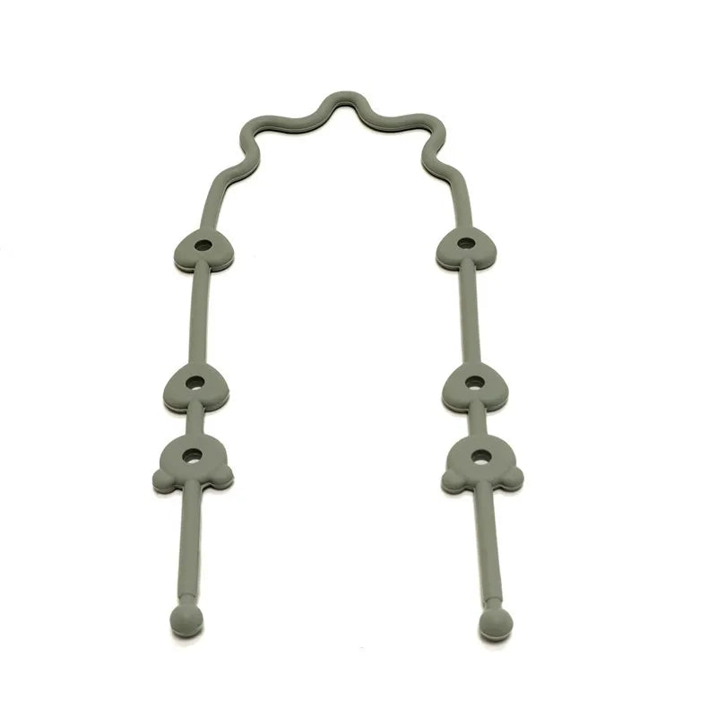 A silicone pacifier clip featuring an anti-drop chain, colored gray.
