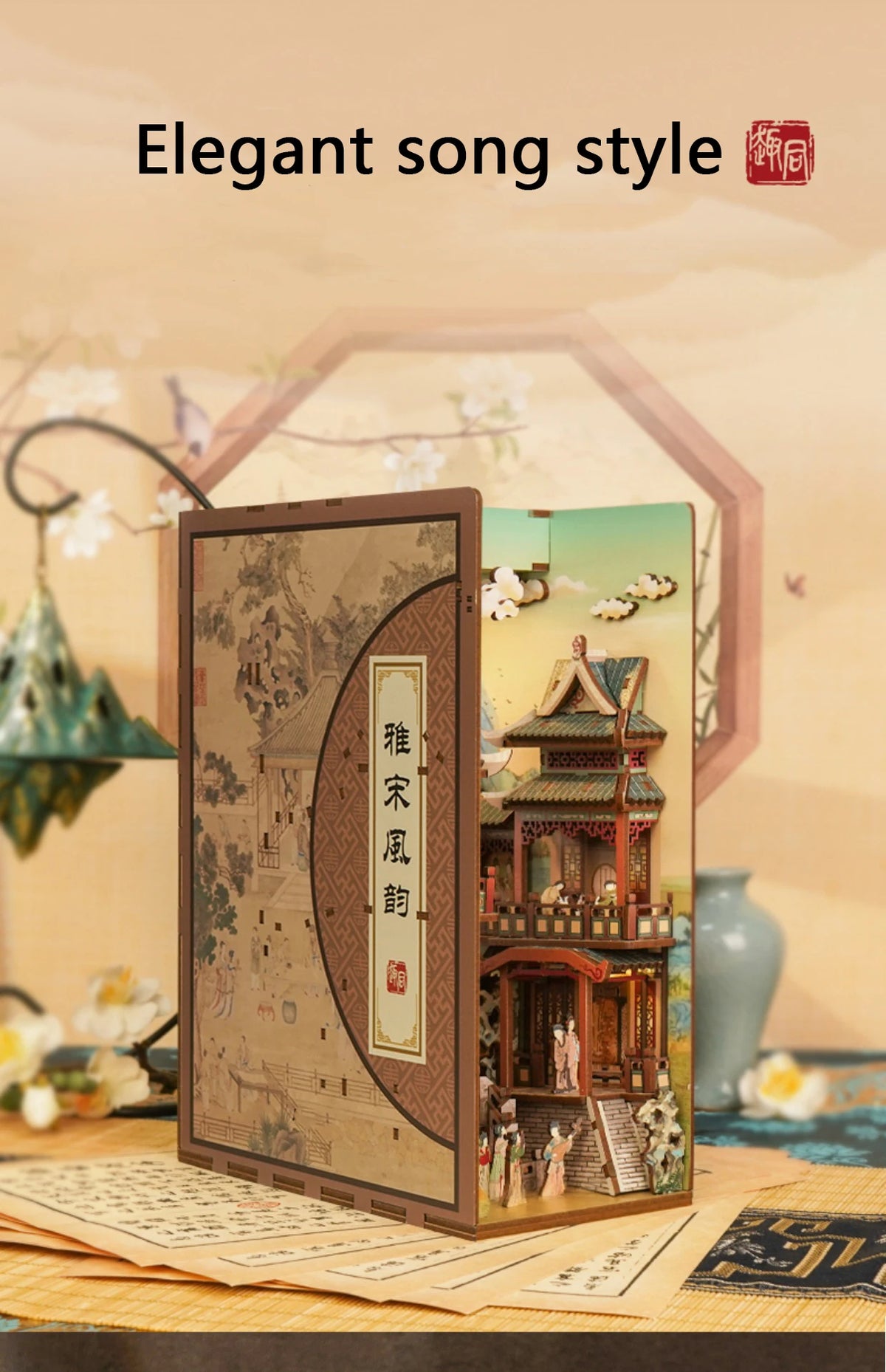 A DIY book nook kit featuring a detailed miniature scene with traditional architecture and LED lighting.