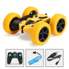 A yellow RC car with large black tires and LED lights, shown alongside its remote control.
