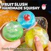 Handmade fruit slush squishy balls in green, blue, and yellow colors being squeezed