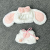 White rabbit costume with pink ears and a heart-shaped bow for a doll