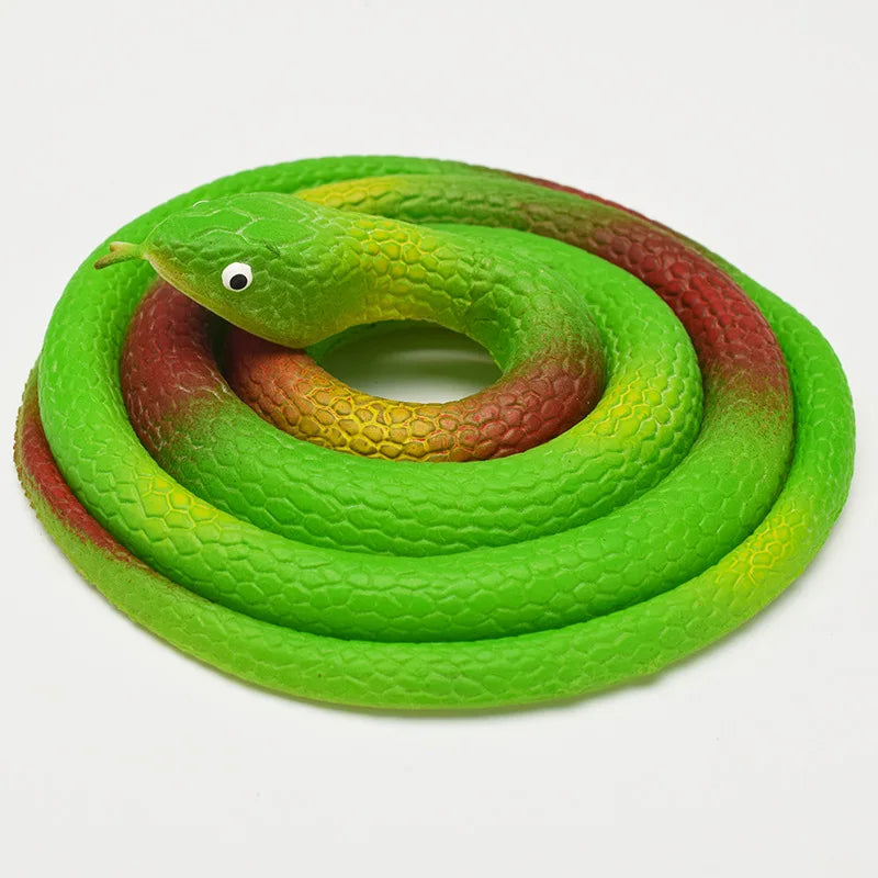 A realistic rubber snake toy with green and reddish-brown scales coiled on a white background.