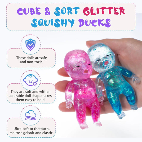 Two squishy silicone ducks with glitter are held in a hand, demonstrating softness and elasticity.