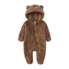 A brown fuzzy baby bear fleece hooded romper with a zipper.