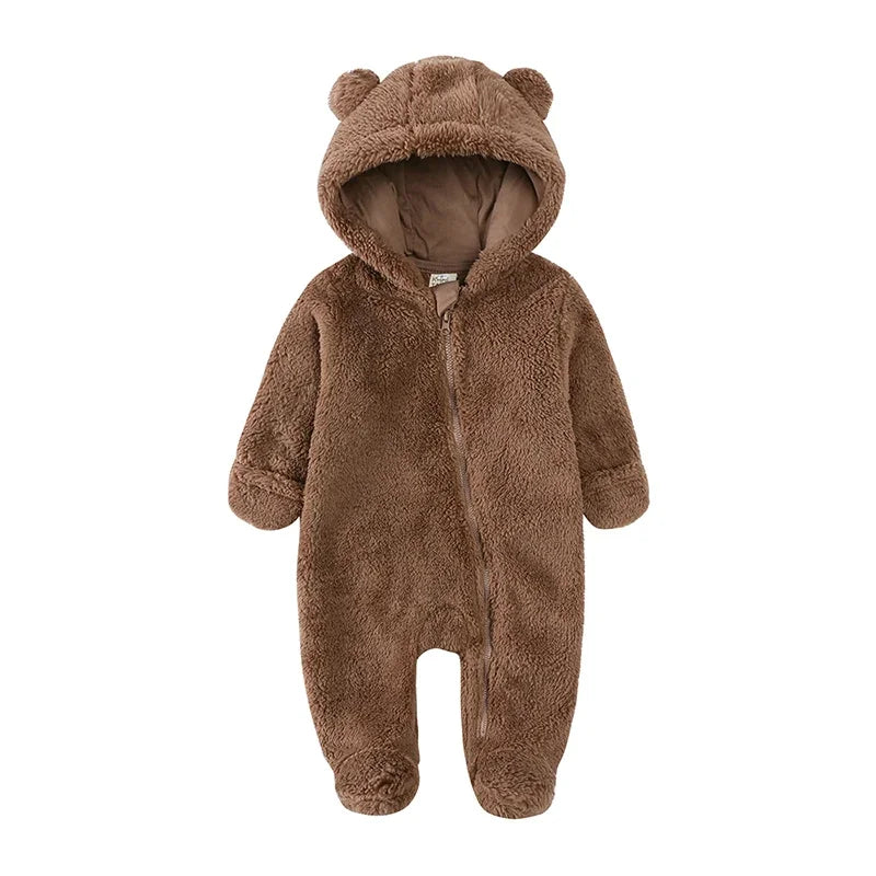 A brown fuzzy baby bear fleece hooded romper with a zipper.