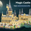 A highly restored yellow and gray magic castle building blocks set featuring towers, walls, and a moat.